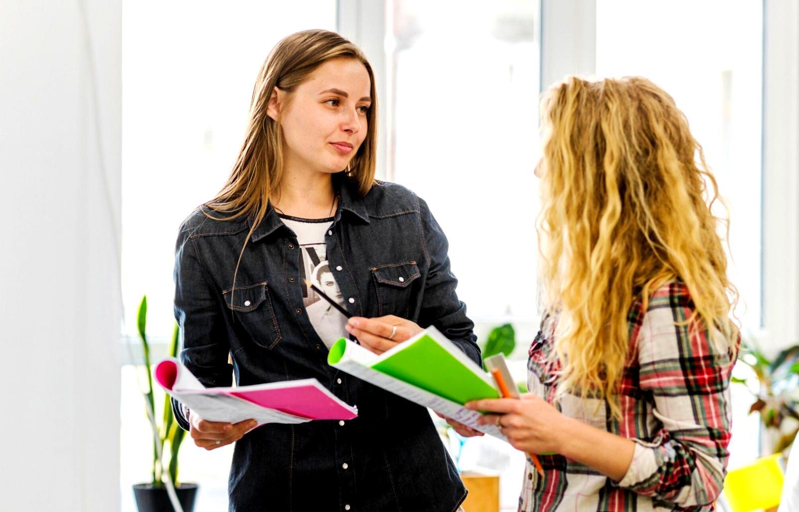 Investment team reviewing seasonal market analysis charts and client portfolio strategies